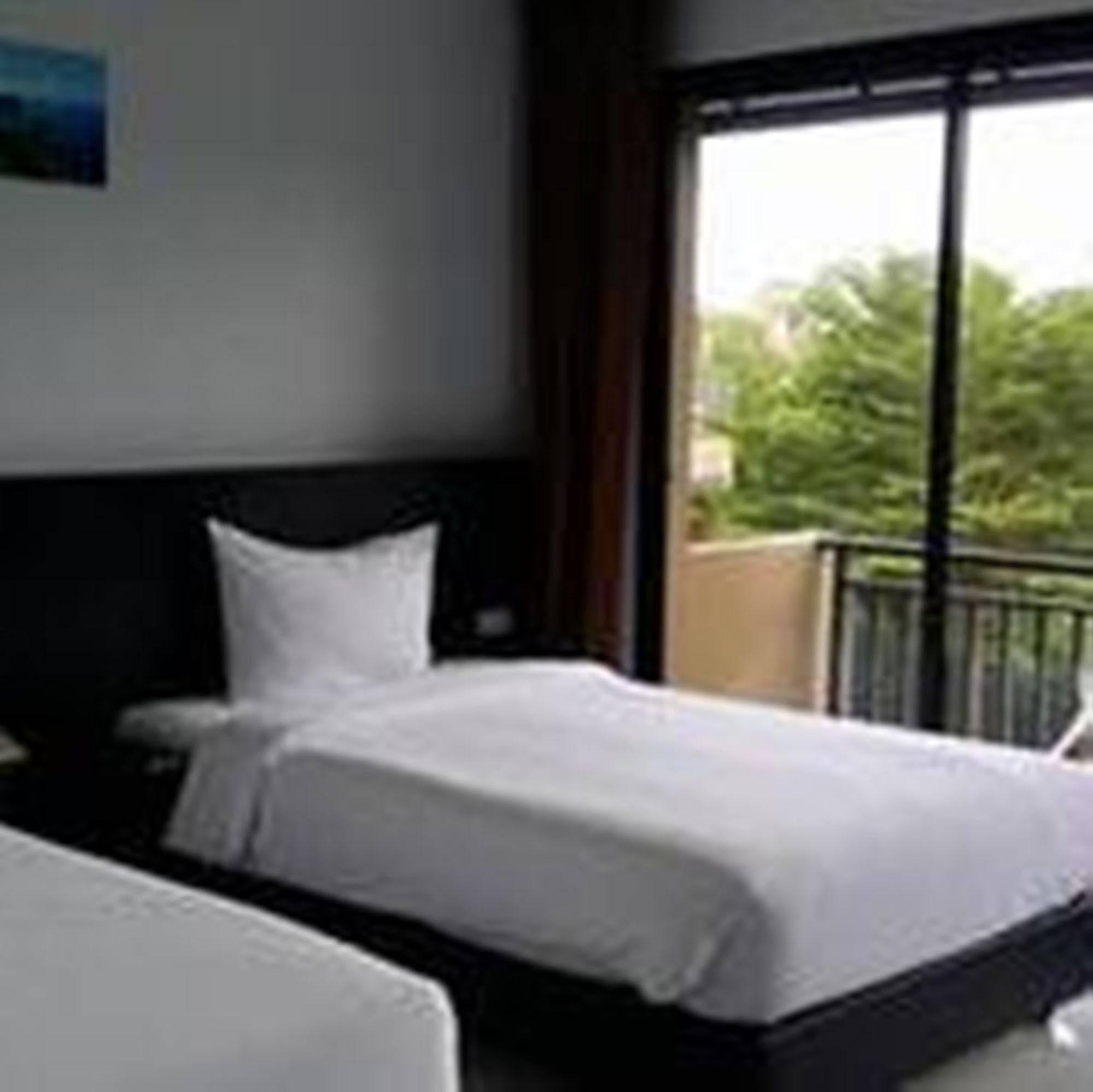 Capital O 486 Naiyang Beach Hotel SHA Plus Phuket Bagian luar foto